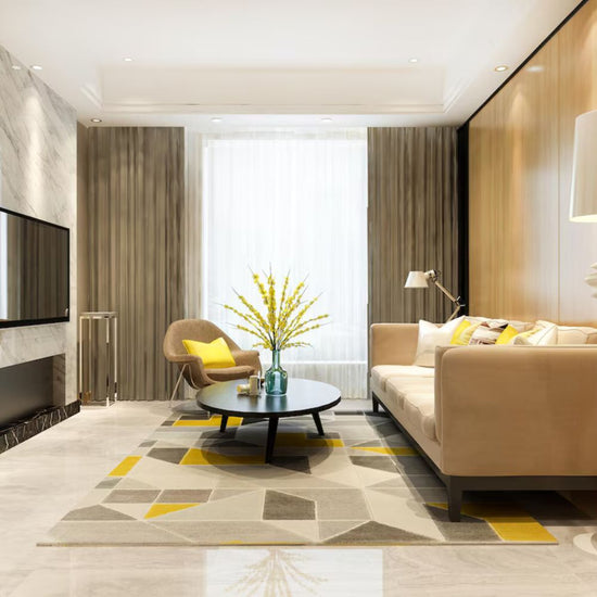 Modern living room with beige sofa, armchair, and coffee table.